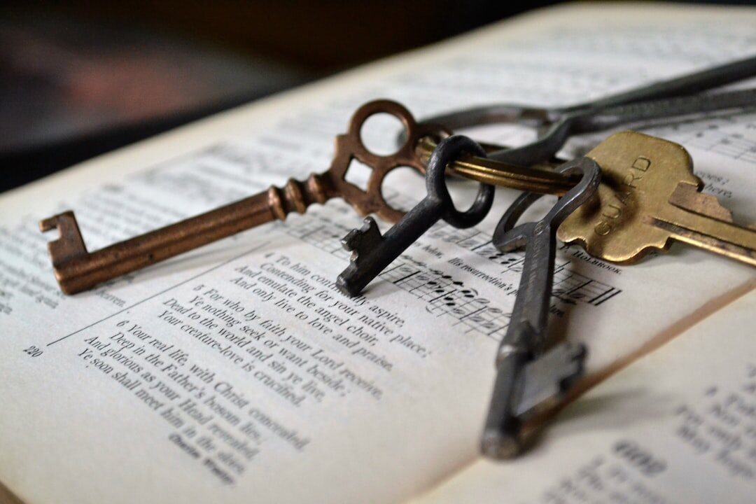 House keys resting on top of legal documents